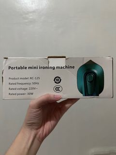 Portable mini ironing machine