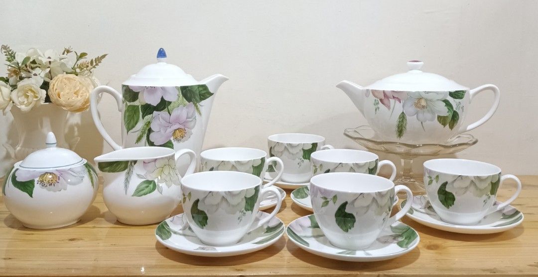 SALE!Royal Standard Coffee & Tea Set (Category: Coffee & Tea Tableware) located in Pagbilao. Submitted by candicearp (Listing ID 1257440082, Image 1). Description: Royal Stafford Coffee & Tea Set Coffee Pot 8.25" height 8" spout to handle Teapot 4.5" height. 8.5" spout to handle 6 pcs. Cups 2.5" height 3.25"rim 6 pcs. Saucers 5.5" in diameter Creamer Pourer 3" height 5.5" spout to handle Sugar Bowl 4" height.