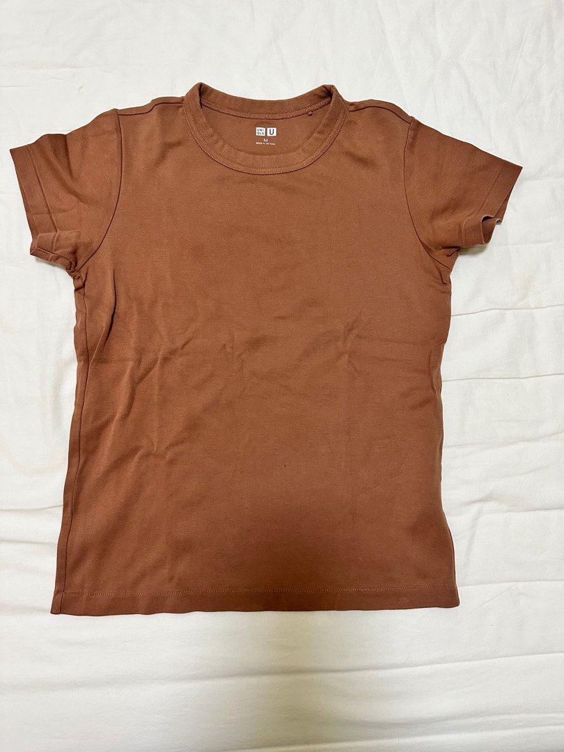 Uniqlo T Shirt (Category: Shirts) located in Paranaque City. Submitted by DeclutterMommaKim (Listing ID 1257443492, Image 1). Description: Two for 500.