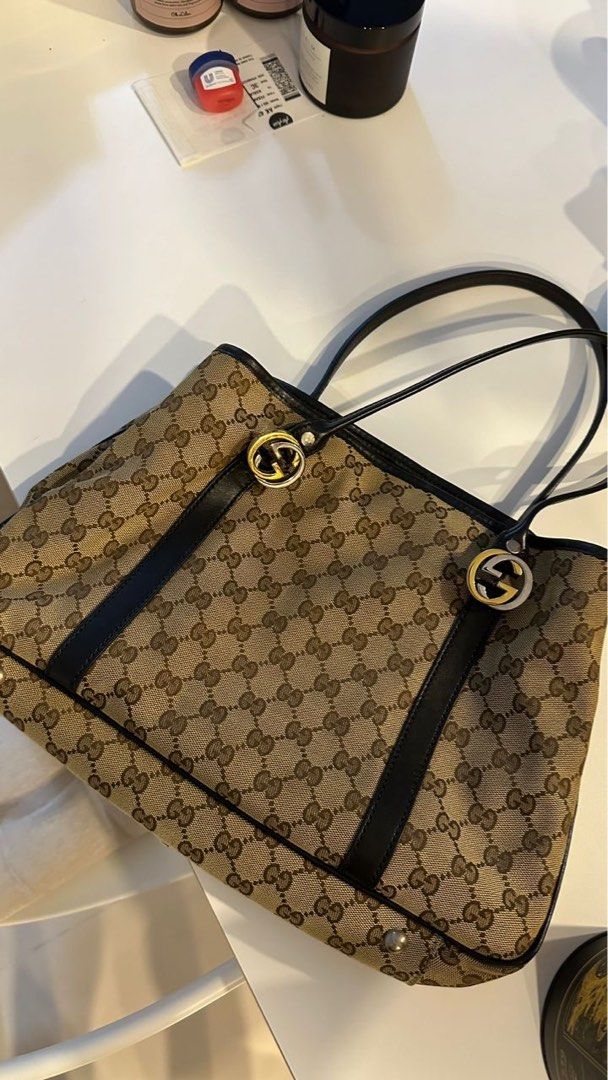 Genuine gucci bag sales
