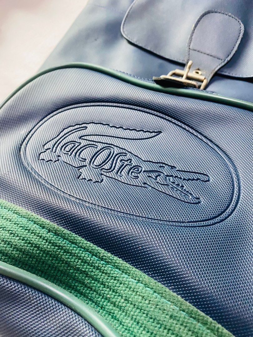 AUTHENTIC LACOSTE Backpack (Category: Luxury Bags & Wallets) located in Quezon City. Submitted by FashionFab (Listing ID 1252625083, Image 2). Description: Dark blue green color in person. Bought in Japan last 2018. Rfs: decluttering.