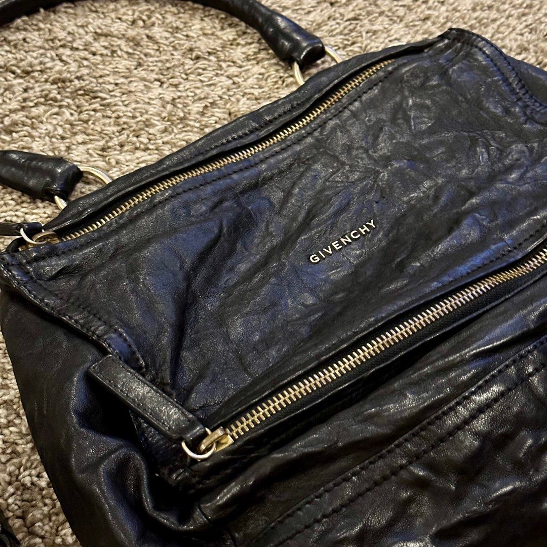 Givenchy Pandora Medium (Category: Luxury Bags & Wallets) located in Manila. Submitted by beyondthebag (Listing ID 1252787886, Image 2). Description: Givenchy Pandora Medium in Black Sheep Skin, Gold Hardware 👜 Made in Italy 💕 Inclusion: long strap Condition: 9/10 excellent condition ✨.