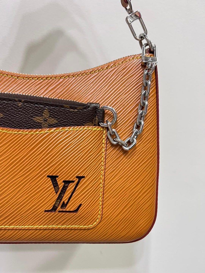 Vintage feel, runway appeal. LOUIS VUITTON Epi Marelle Gold Miel