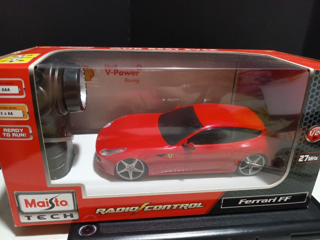 Shell ferrari FF R.C 1:24 remote control (Category: Vehicle & Diecast Models) located in Manila. Submitted by anntoys29 (Listing ID 1252668766, Image 1). Description: Shell ferrari FF scale 1:24 radio control vehicle pistol grip controller brand maisto included 1 vehicle and 1 transmitter.