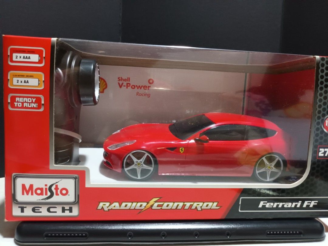 Shell ferrari FF R.C 1:24 remote control (Category: Vehicle & Diecast Models) located in Manila. Submitted by anntoys29 (Listing ID 1252668766, Image 3). Description: Shell ferrari FF scale 1:24 radio control vehicle pistol grip controller brand maisto included 1 vehicle and 1 transmitter.