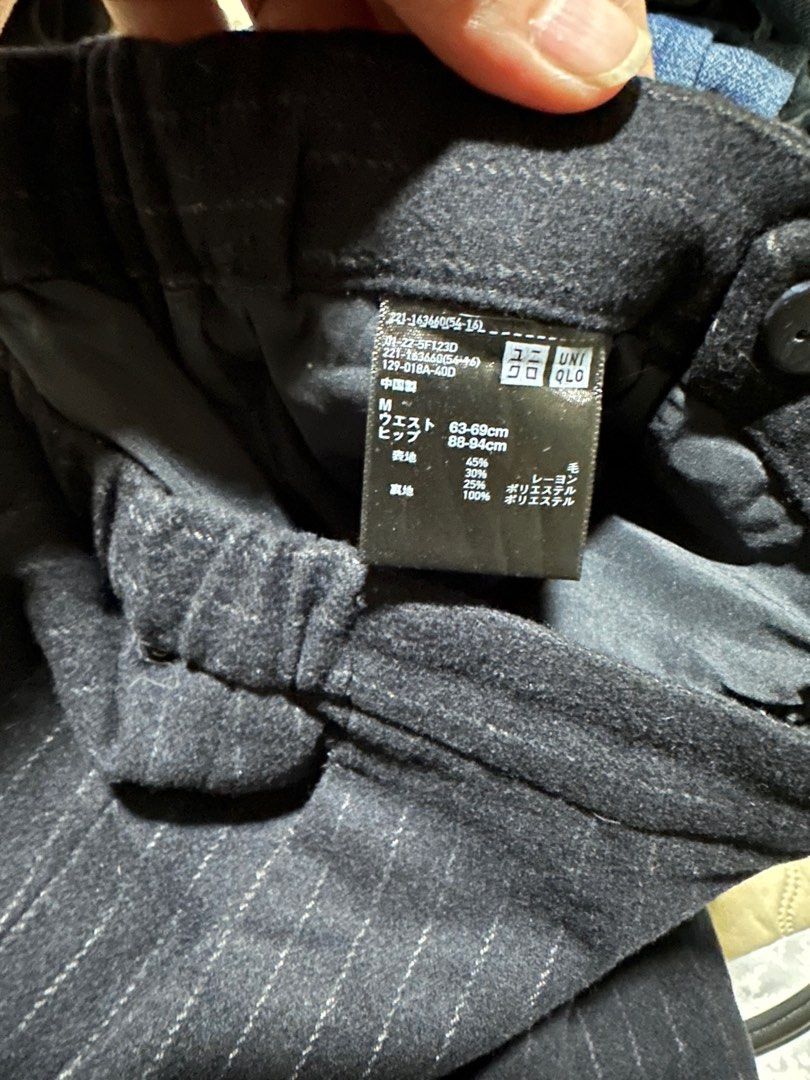 Uniqlo Pinstrip Trousers (Category: Other Bottoms) located in Quezon City. Submitted by teetharejade (Listing ID 1252741972, Image 3). Description: Size Medium, black pinstripe.