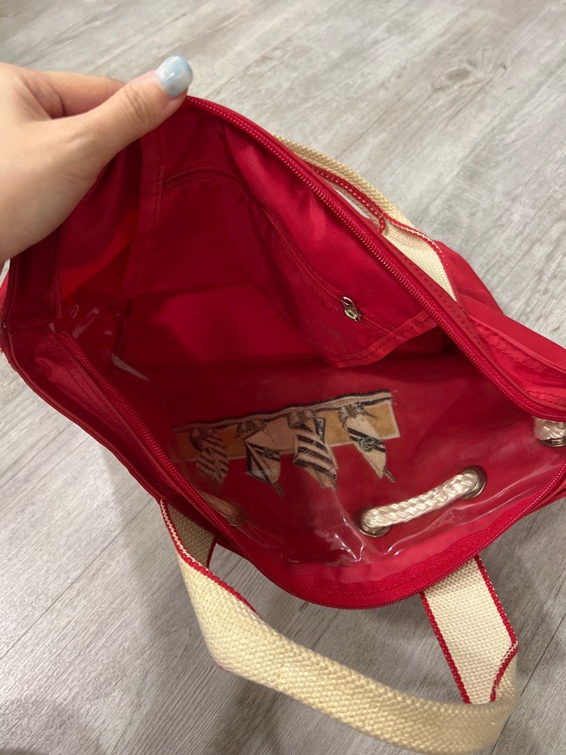 Well used red beach bag Tioman