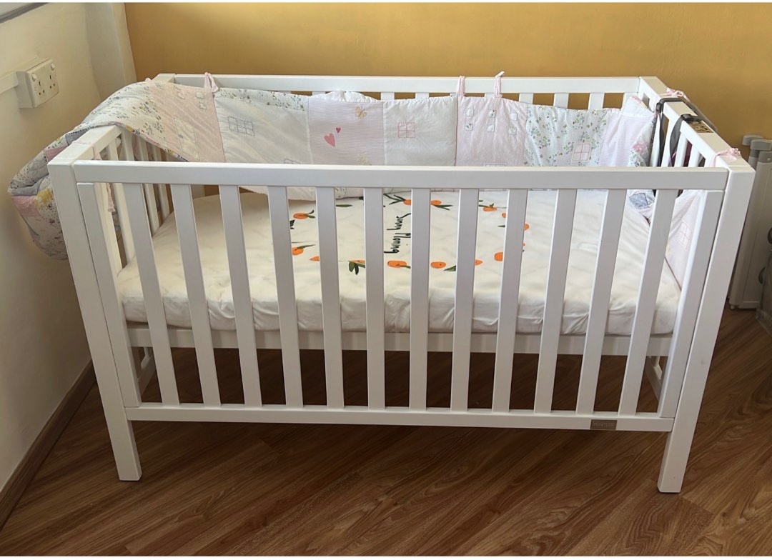 Baby Cot (can fit 2 newborn twins). Comes complete with mattress