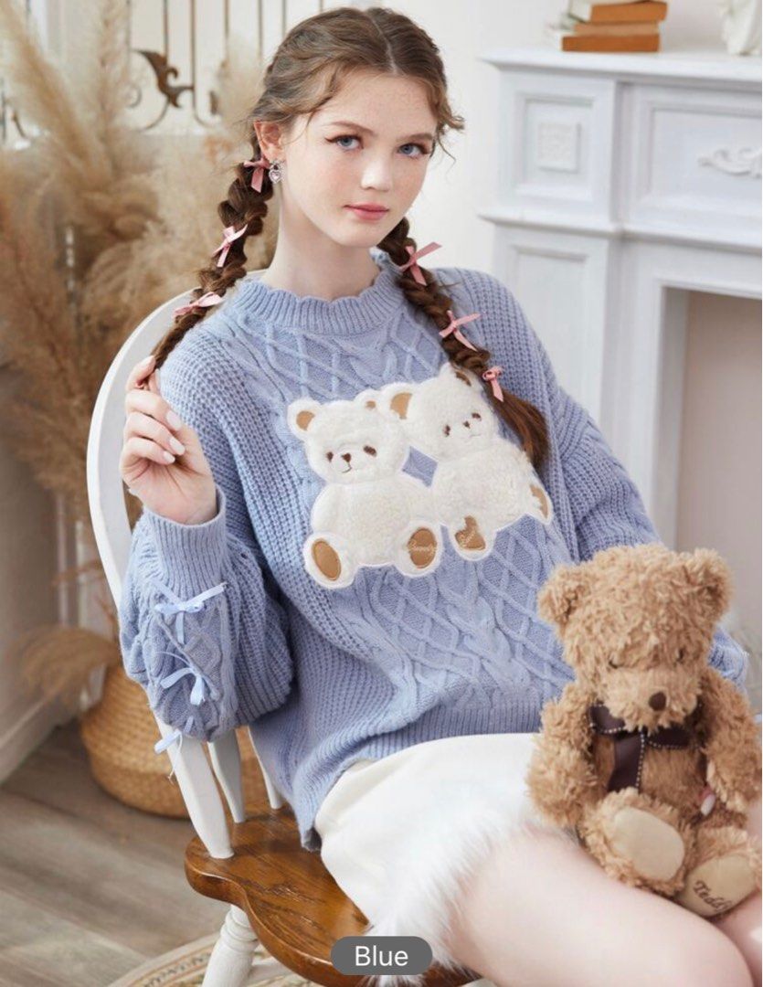 blue knitted bear sweater