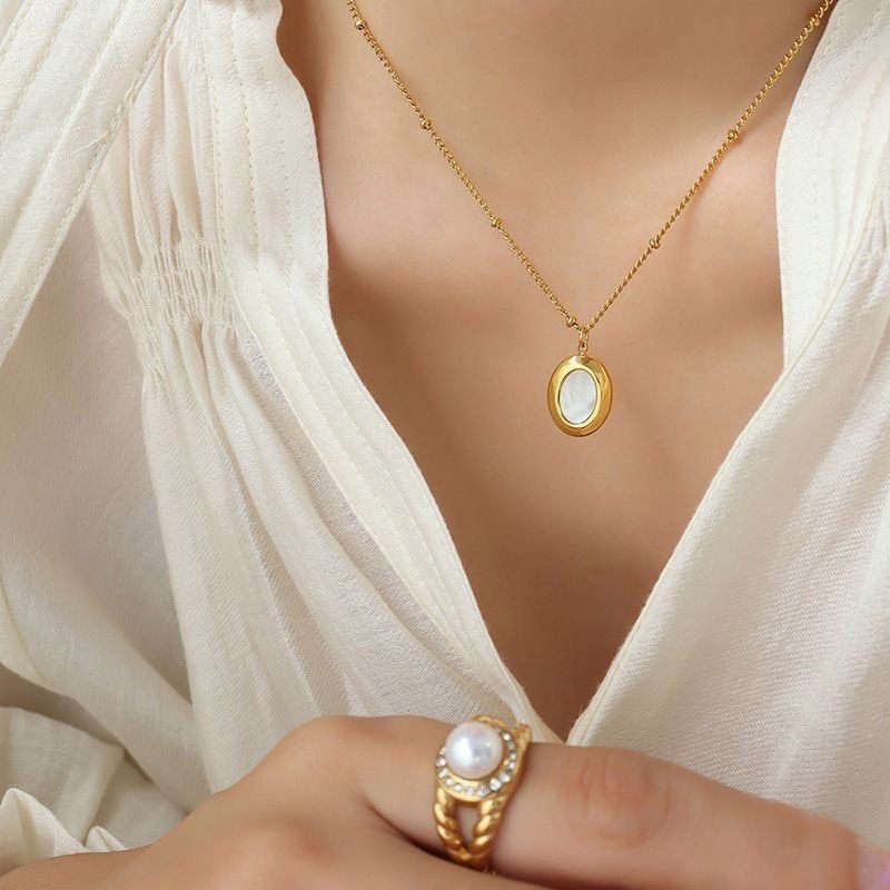 Gold oval new arrivals pendant