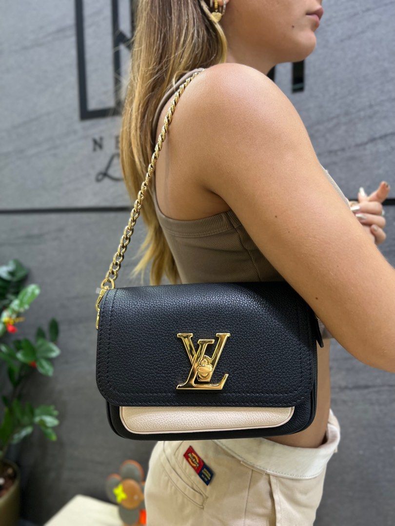 Louis Vuitton bag. Lockme Phone Pouch. Color black-creme. 