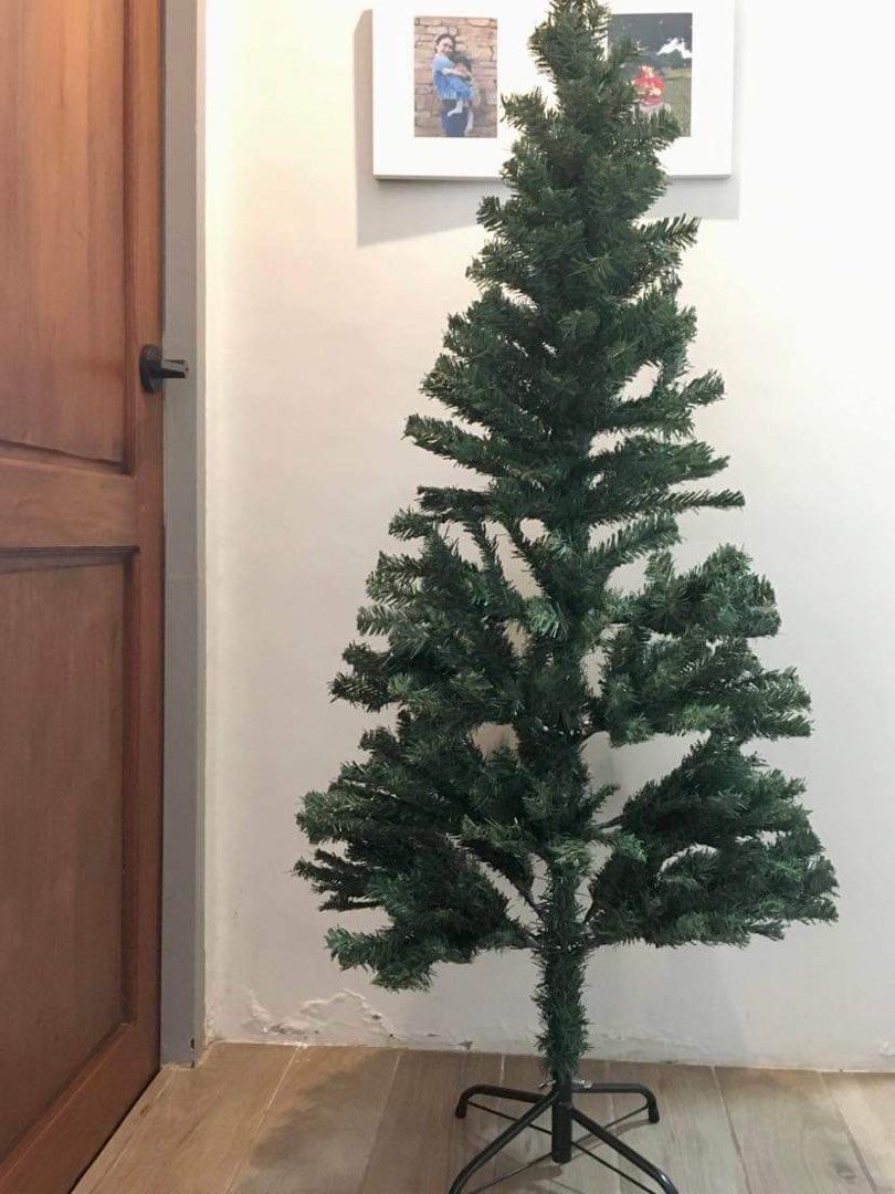 Pre-loved Christmas Tree with Iron Foot (Category: Other Home Decor) located in Mandaluyong City. Submitted by zoecabrera (Listing ID 1257527803, Image 1). Description: .