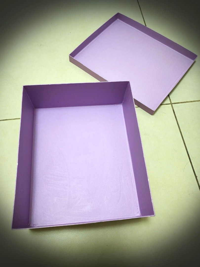 [SALE] Purple Gift Box (Category: Storage Boxes & Baskets) located in Quezon City. Submitted by queentana_finds (Listing ID 1257672088, Image 2). Description: Dimensions are in the photo album. Lightly used. Hard box. Good for storage or organizer or gift box. Color is purple. Lighting affects the color in the photos..
