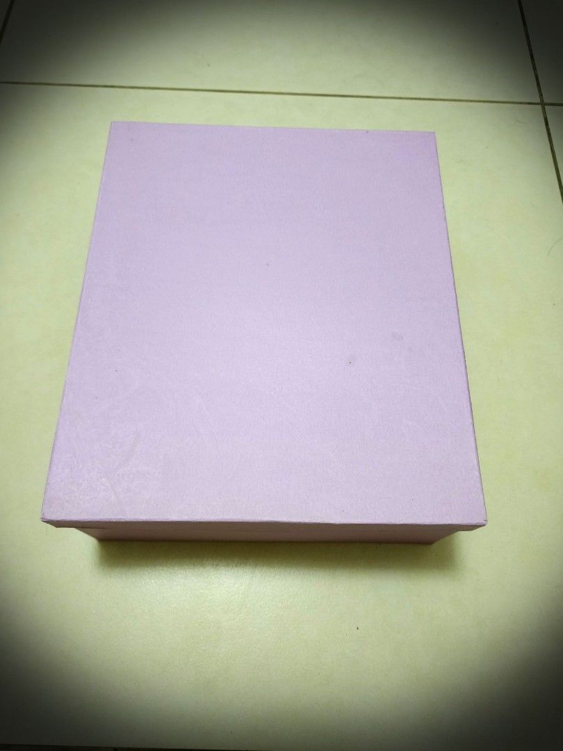 [SALE] Purple Gift Box (Category: Storage Boxes & Baskets) located in Quezon City. Submitted by queentana_finds (Listing ID 1257672088, Image 3). Description: Dimensions are in the photo album. Lightly used. Hard box. Good for storage or organizer or gift box. Color is purple. Lighting affects the color in the photos..