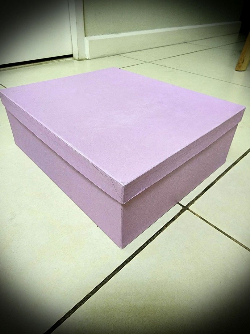 [SALE] Purple Gift Box (Category: Storage Boxes & Baskets) located in Quezon City. Submitted by queentana_finds (Listing ID 1257672088, Image 1). Description: Dimensions are in the photo album. Lightly used. Hard box. Good for storage or organizer or gift box. Color is purple. Lighting affects the color in the photos..