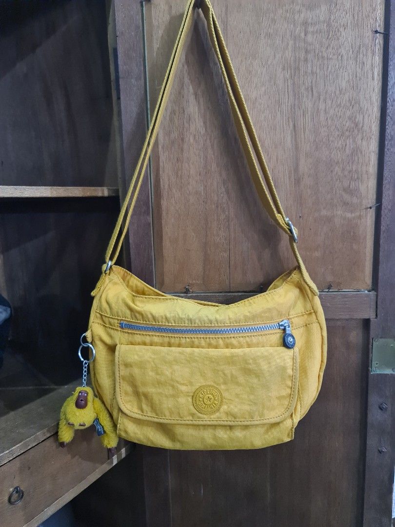 Sling bag Kipling yellow rare Men s Fashion Bags Sling Bags on
