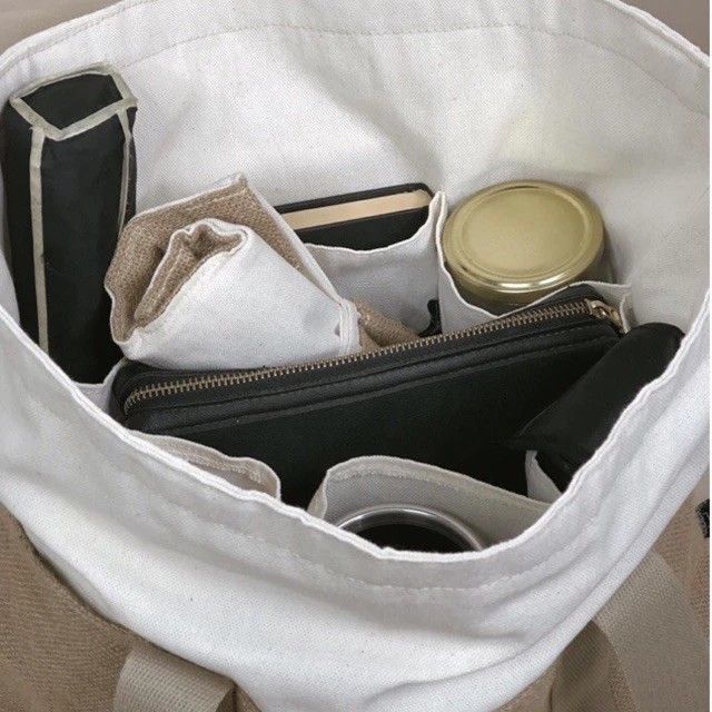 Artotell Burlap Canvas Tote Bag (Category: Tote Bags) located in Baguio. Submitted by _tindeclutters (Listing ID 1252966279, Image 2). Description: Artotell 12-pocket Burlap Canvas Tote Bag with Khaki Strap and Zipper PRODUCT DESCRIPTION • Bag Size: 18.5”W x 13.5”H x 5.5” base • Made from canvas and jute fabric • 6 internal canvas pockets • 6 external burlap pockets Super spacious bag and durable. Bought this for PHP 700 Selling it for PHP 500 RF