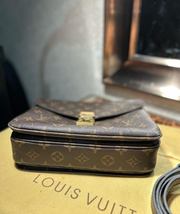 LOUIS VUITTON Monogram Pochette AR1928 with gold chain strap