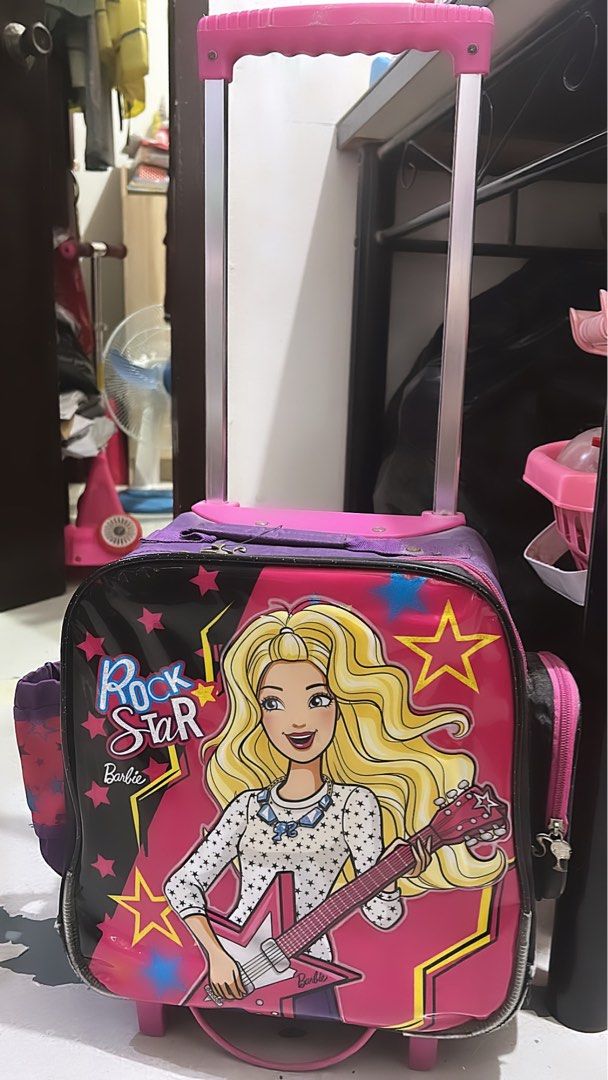 Barbie Trolly Bag original preloved (Category: Babies & Kids Fashion) located in Muntinlupa City. Submitted by jeymv (Listing ID 1252972996, Image 1). Description: Preloved but in a good condition❤️.