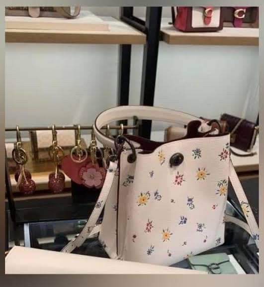 coach charlie bucket 21 with wildflower print