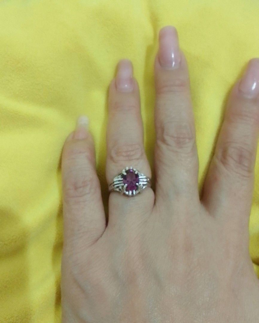 Ladies ring. Purple color stone (Category: Rings) located in Cavite. Submitted by dreamsky21 (Listing ID 1252963059, Image 1). Description: accessories ladies Ring silver color purple color stone size 5.5 no markings bought in Japan.