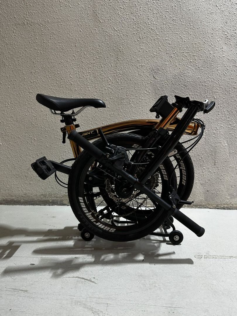 Mint Trifold 9S 16" Disc Brake Foldable Bike Folding Bicycle 9 Speed same as SUNRIMOON rose gold M bar (Category: Bicycles) located in Singapore. Submitted by passionliving (Listing ID 1252895868, Image 3). Description: SLIGHT scratches on the FRAME Frame material: Chromoly steel Groupset: Premium Taiwan LTWOO External 9 speed R5 shifter/rear derailleur Wheelset: 7o'clock 349 16" (4 bearing hub) Front 100mm Rear 135mm O.C.D: Front-100mm/Rear-135m
