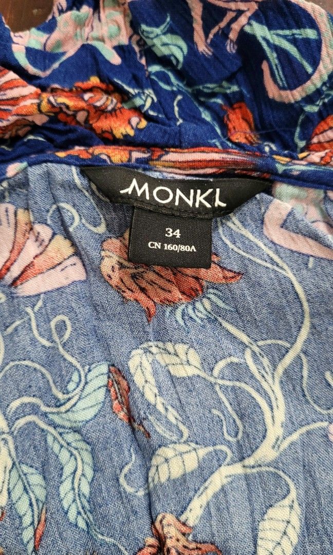 Monki Wrap Blouse (Category: Others Tops) located in Davao. Submitted by NearlyNew (Listing ID 1252807478, Image 2). Description: Size: fits small to medium No when worn pics please 😉 Payment thru GCash J&T Express Shipping Fee: 100 pesos Ships on Saturday only.