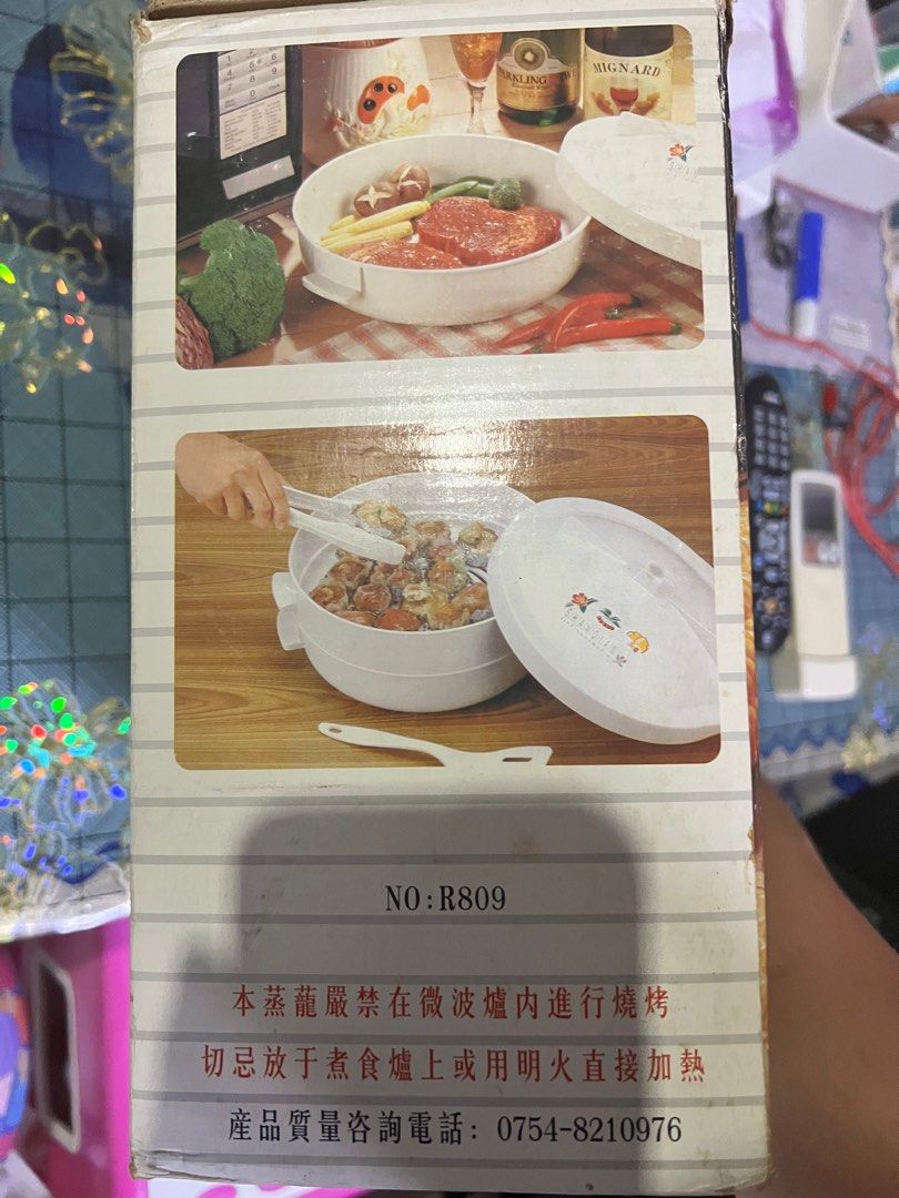 Multi level Serving cookware (Category: Other Kitchenware & Tableware) located in Singapore. Submitted by collective_minds (Listing ID 1252809536, Image 2). Description: 2 level serving cookware comes with tongs and a large flat spoon. Can use for putting steamboat prep food. PM to find out more.