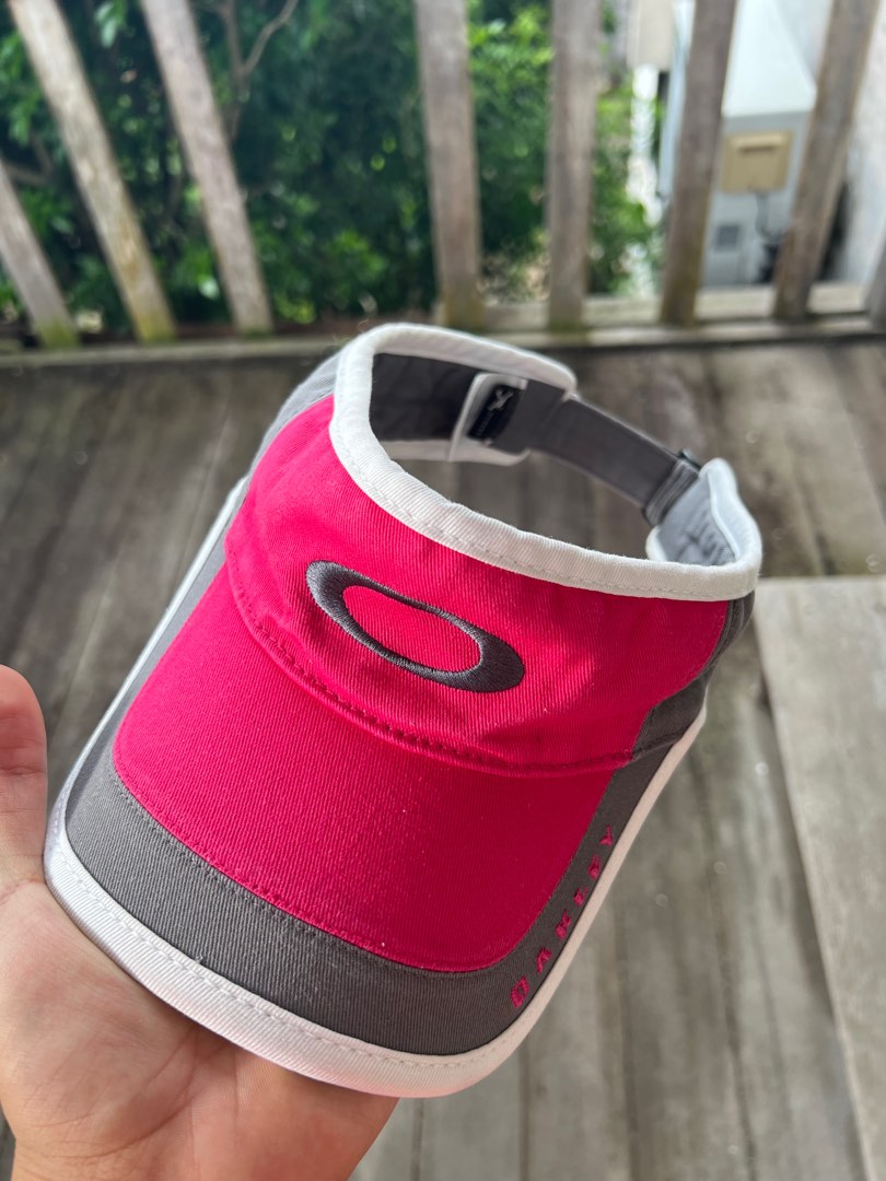 Oakley visor, Men's Fashion, Watches & Accessories, Cap & Hats on Carousell