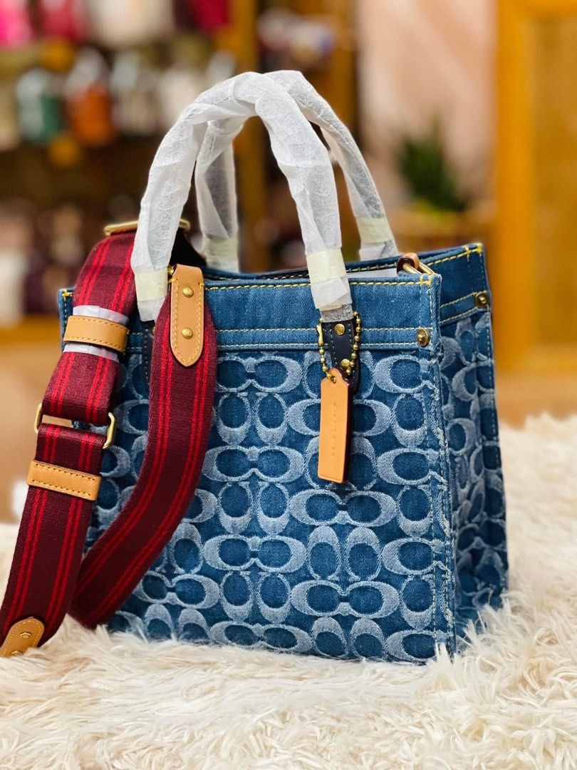 💯ORIGINAL COACH FIELD TOTE 22 DENIM (Category: Luxury Bags & Wallets) located in Quezon City. Submitted by ashongsstore (Listing ID 1212121447, Image 2). Description: 🐎C0AÇH COLLECTION 🐎 🇵🇭ONHAND🇵🇭 ‼️Please look at our pictures as that is exactly what you are purchasing‼️ 💯GUARANTEED ORIGINAL AND AUTHENTIC or TRIPLE YOUR MONEY BACK! Not REPLICA, OEM, TOP GRADE QUALITY, AUTHENTIC QUALITY or Any other Terms to DENOTE FAKE! 😎 . . . Disclaim