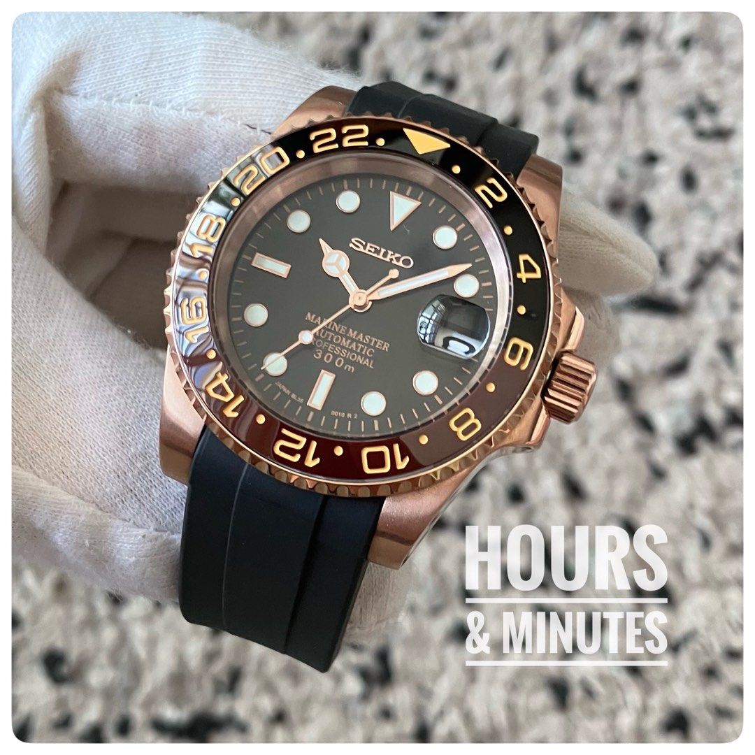 Seiko black and online rose gold watch