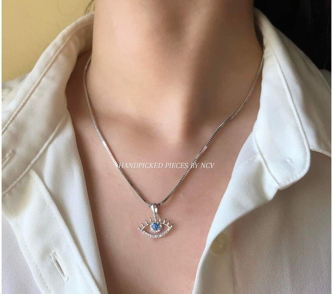 Evil eye discount pendant white gold