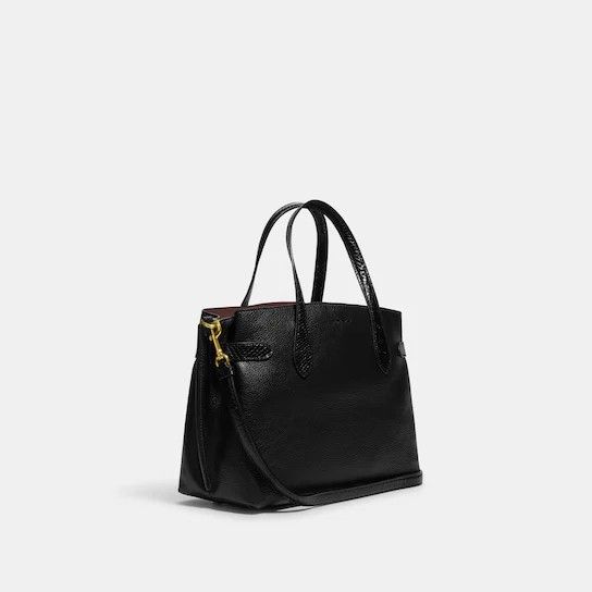 🇺🇲 Authentic Coach Hanna Carryall (Category: Luxury Bags & Wallets) located in Santa Cruz. Submitted by janelovebagswatchesshoesph (Listing ID 1253002049, Image 2). Description: Product Details Refined pebble leather and snake-embossed leather Inside multifunction pocket Center zip compartment Magnetic snap closure, fabric lining Handles with 5 3/4" drop Detachable strap with 20 1/2" drop for shoulder or crossbody wear Four protective feet at b