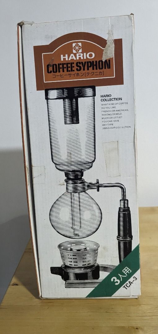 Hario Coffee Syphon TCA-3 (Category: Coffee & Tea Tableware) located in Paranaque City. Submitted by bluecatnip (Listing ID 1253048998, Image 3). Description: Hario Coffee Syphon TCA-3 - with minor surface defects on handle - glassware and cover in good condition, no damage - metal spring, filter, and cloth not included Buyer shoulders courier fee.