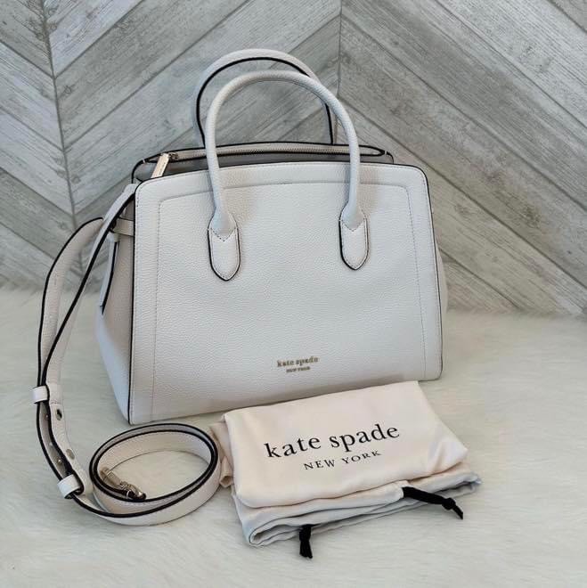 Kate Spade Knott Medium Saddle Bag In Parchment