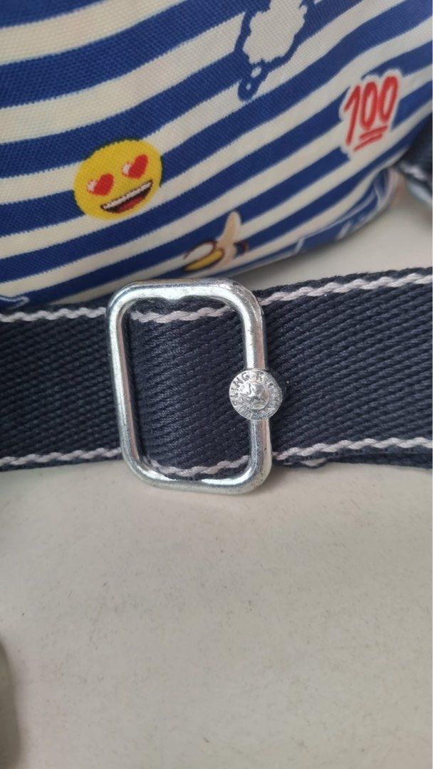 Kipling backpack (Category: Backpacks) located in Singapore. Submitted by peachdark (Listing ID 1253135530, Image 4). Description: Kipling striped blue backpack with original price tag and keychain. Many compartments and pockets. Selling to clear asap. .