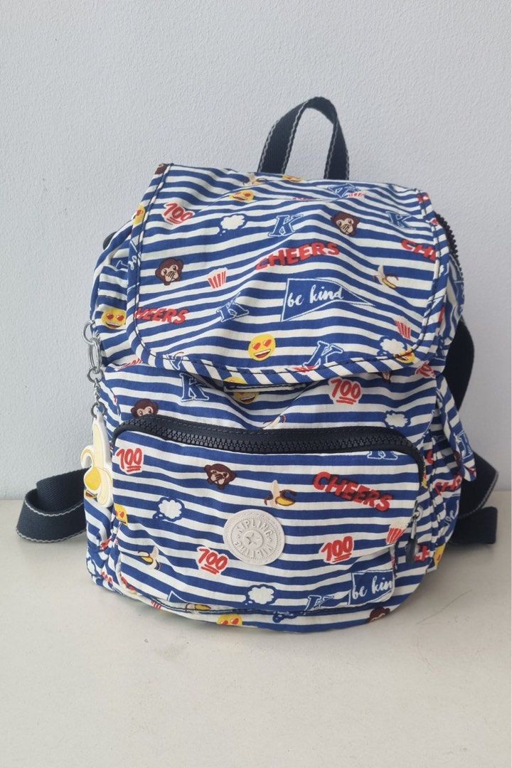 Kipling backpack (Category: Backpacks) located in Singapore. Submitted by peachdark (Listing ID 1253135530, Image 1). Description: Kipling striped blue backpack with original price tag and keychain. Many compartments and pockets. Selling to clear asap. .