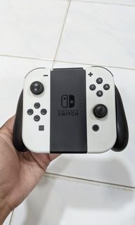 Original joycon nintendo switch oled (white) with grip