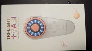 Skin inc tri-light SABI skin care device (still under warranty)