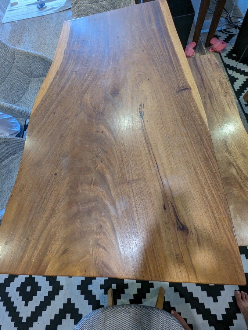 Solid suar wood dining table (Category: Tables & Sets) located in Singapore. Submitted by chicharito123 (Listing ID 1252850340, Image 1). Description: used for a number years, other than scratches from day to day used, in good conditions. properly dried so no splits/cracks and will continue to be so. selling to get new look at home table l 150cm, b70-85cm, h80cm.