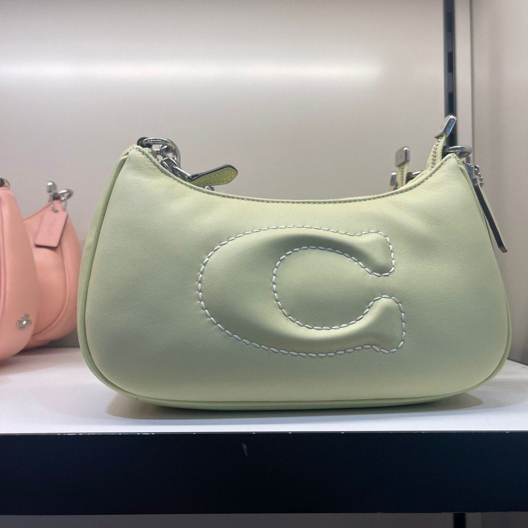 Coach cosmetic sales bag outlet
