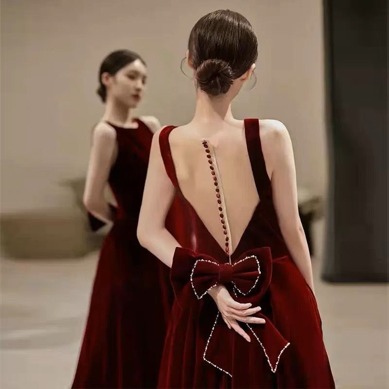 Burgundy dress cloche occasional slit from elastic fabric with v-neckline  with embellished accessories