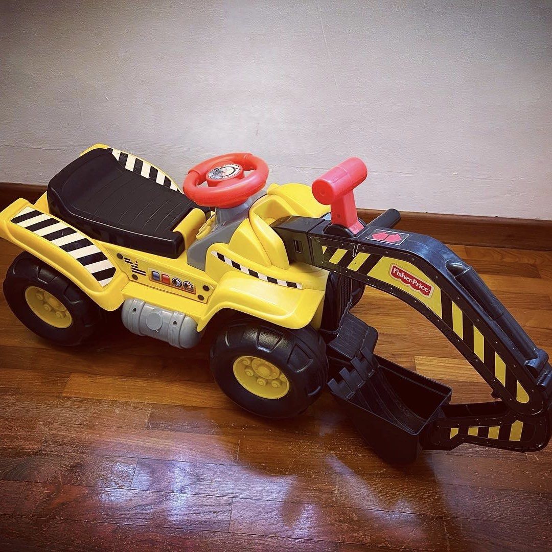 Fisher price ride on excavator top