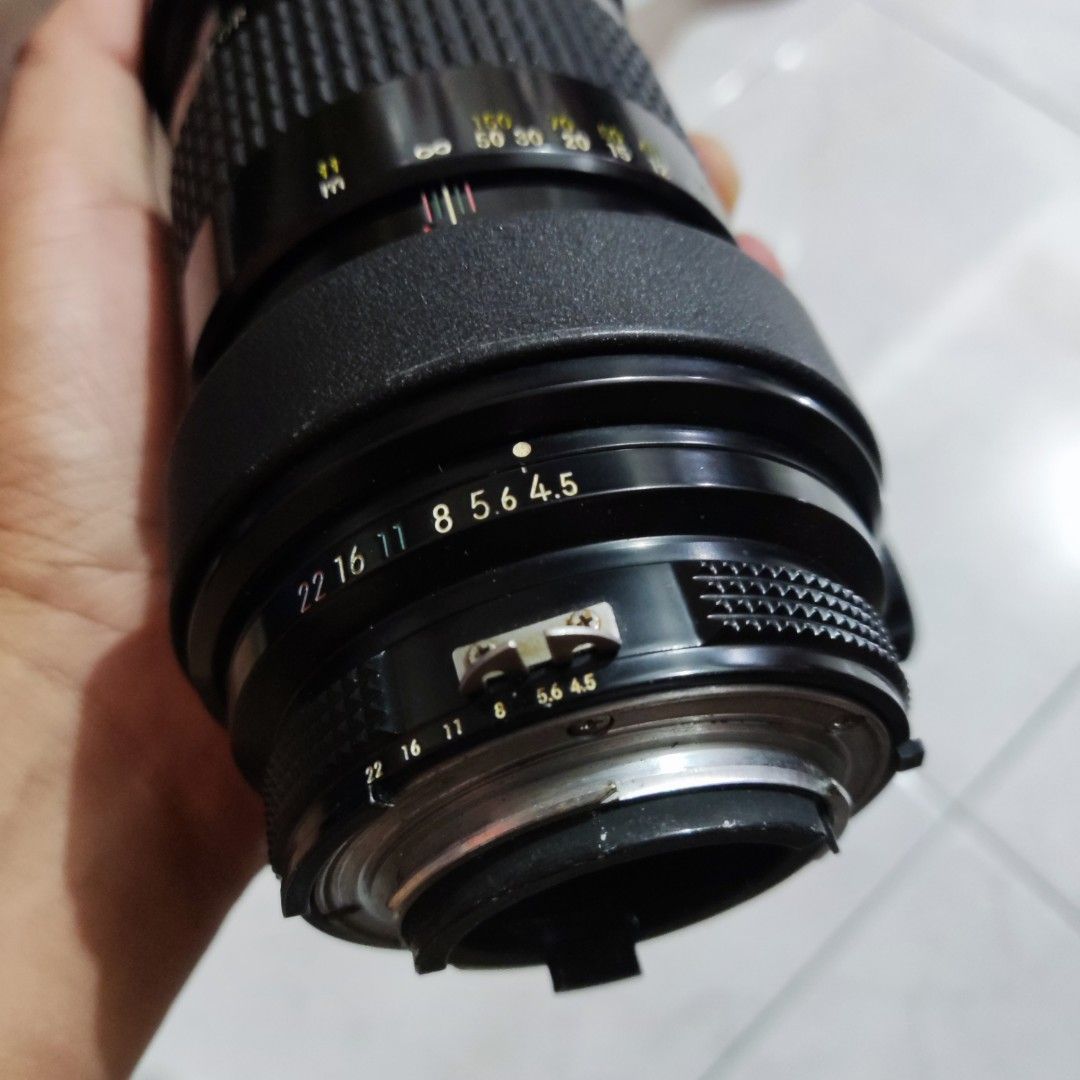 Nikon 300mm f4.5 (Category: Lens & Kits) located in Legazpi City. Submitted by fastpicksph (Listing ID 1253245596, Image 3). Description: For Sale!!! Nikon 300mm f4.5 Caution!!! This is a MANUAL FOCUS LENS! For Nikon Film Cameras Can Be used on Nikon DSLR's Can Be adapted/used in Mirrorless Cameras from Canon/ Sony/ Olympus/ Panasonic / Fujifilm/ Nikon/ etc basta may proper adapter Lens Hood works Tripod Collar works no issue Focusing No issue No
