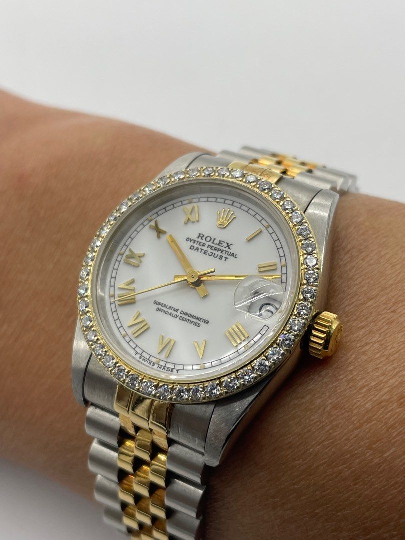 Gold rolex new arrivals diamond bezel