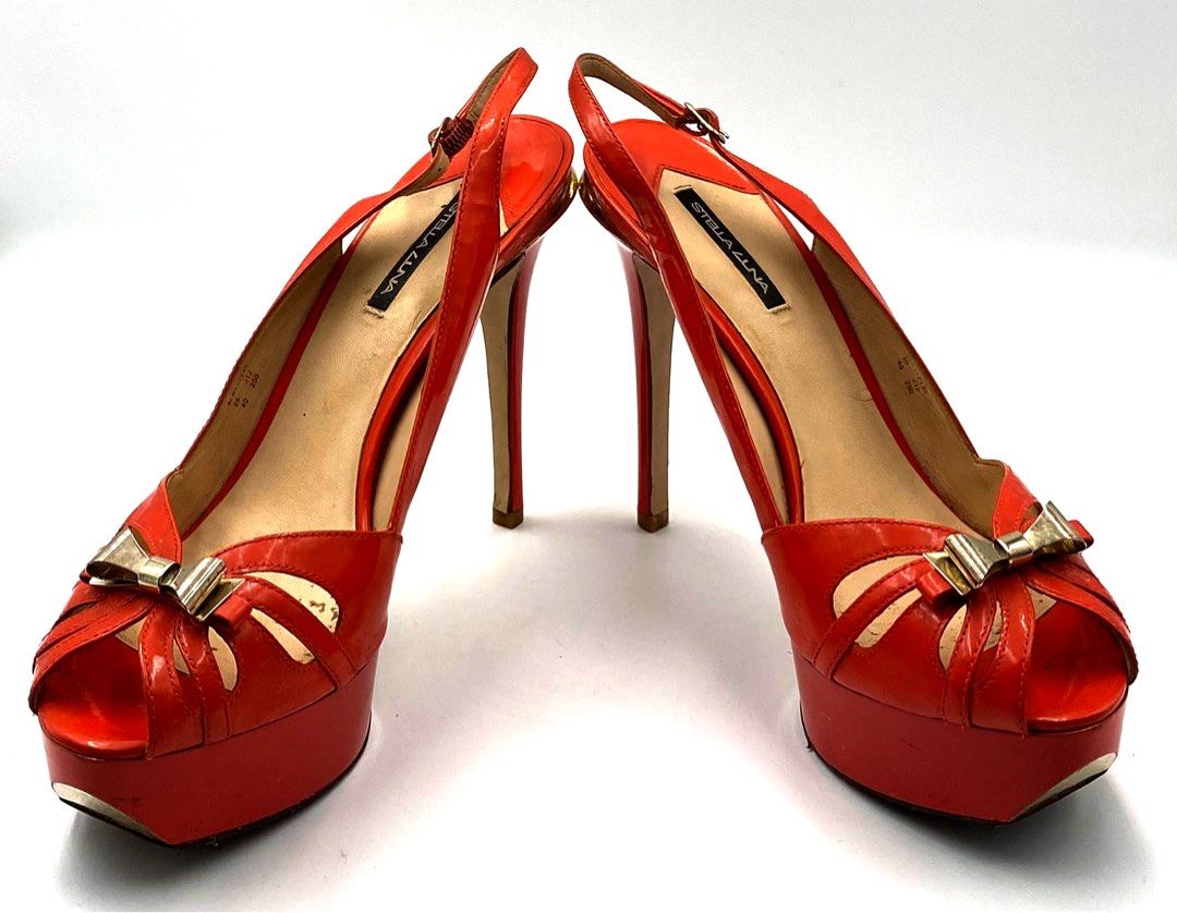 Stella Luna Orange Heels (Category: Heels) located in Paranaque City. Submitted by peoniesandpearls.bird (Listing ID 1253340865, Image 1). Description: Stella Luna Orange Patent Leather Sling back Platform Heels with Box Size EU 40/ US 9 Fits Size 9.5 Medium Brand new Purchased, stored, forgotten but recently found Bought Multiples of same style and kind Rockwell, Powerplant Mall Comes with a dust bag and original box Photographs may appear light