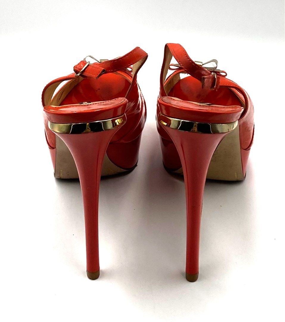 Stella Luna Orange Heels (Category: Heels) located in Paranaque City. Submitted by peoniesandpearls.bird (Listing ID 1253340865, Image 3). Description: Stella Luna Orange Patent Leather Sling back Platform Heels with Box Size EU 40/ US 9 Fits Size 9.5 Medium Brand new Purchased, stored, forgotten but recently found Bought Multiples of same style and kind Rockwell, Powerplant Mall Comes with a dust bag and original box Photographs may appear light