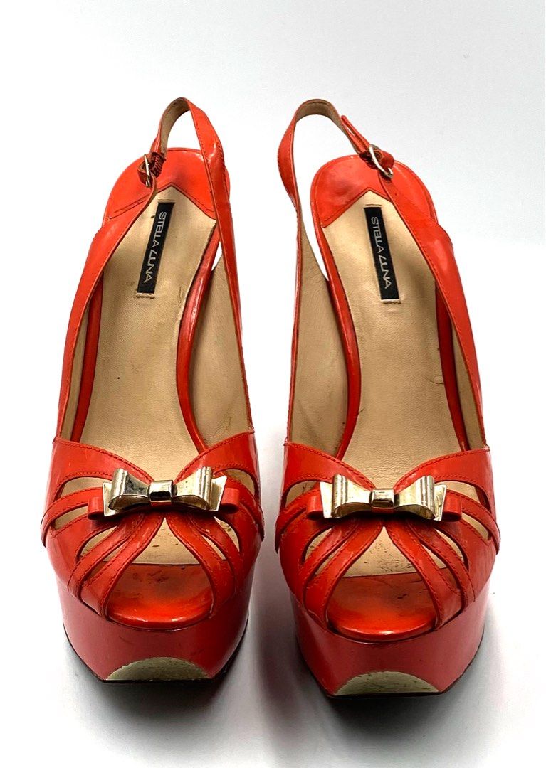 Stella Luna Orange Heels (Category: Heels) located in Paranaque City. Submitted by peoniesandpearls.bird (Listing ID 1253340865, Image 2). Description: Stella Luna Orange Patent Leather Sling back Platform Heels with Box Size EU 40/ US 9 Fits Size 9.5 Medium Brand new Purchased, stored, forgotten but recently found Bought Multiples of same style and kind Rockwell, Powerplant Mall Comes with a dust bag and original box Photographs may appear light