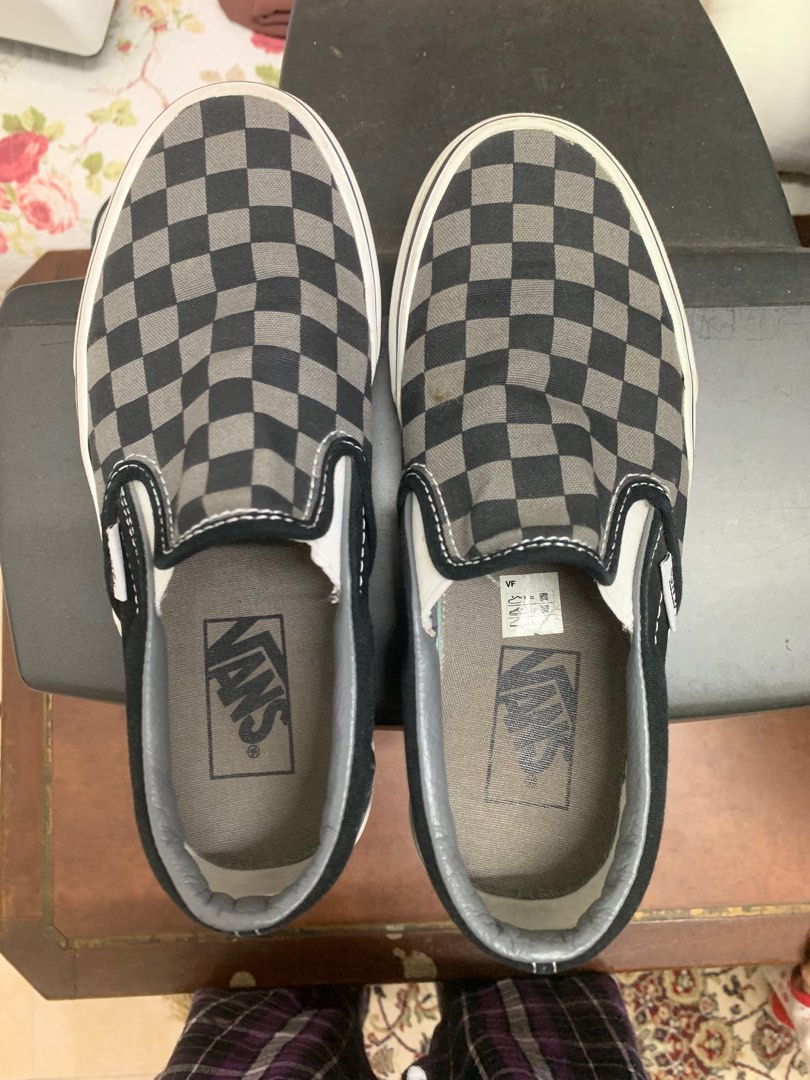 Silver and black top checkered vans