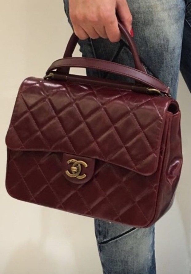 Vintage Chanel Slingbag (Category: Bags & Wallets) located in Kuala Kangsar. Submitted by Hani_Itsar (Listing ID 1171564933, Image 3). Description: Colour : Burgundy/maroon Material: Calf Skin ( Vintage bag) Condition : 9/10 *datecode *design n brand yg sama seperti isteri artis pakai😍..warna je berbeza *nak let go sbb jarang diguna *boleh refer gambar ke 4 Size: Medium Length :28cm Width: 8cm Height: 20cm *tali asal..n berat.. *handcarry/should
